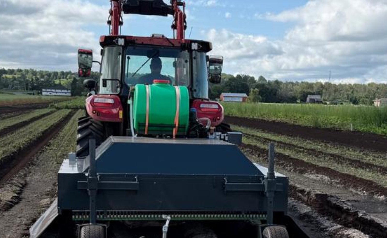 BearClaw Archer precision spray unit in a row-crop field